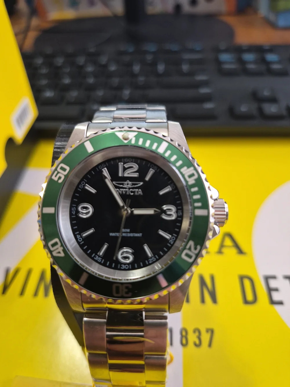 Invicta Men's Stainless Steel Watch with Green Bezel and Black Dial